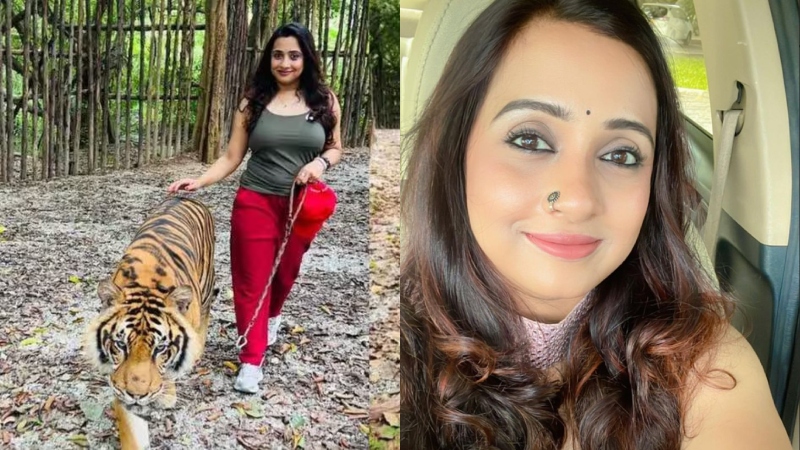 Sorry can't pay attention to the tiger. Actress Poojita Menon walks with the tiger.  Full of comments below the video