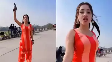 To become viral, the young woman danced with a gun on the country road. Finally, what happened
